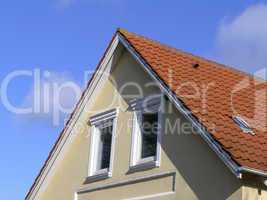 Attic with red tile roof