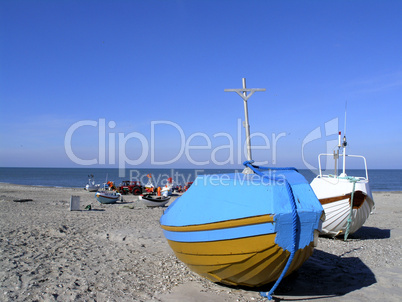 Blue boat on beach
