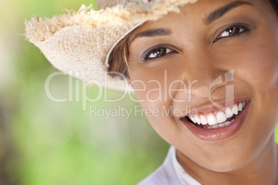 Beautiful Ethnic Mixed Race Woman Laughing In Straw Cowboy Hat