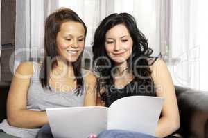 Two female students learning together