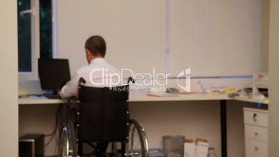 Successful businessman with wheelchair