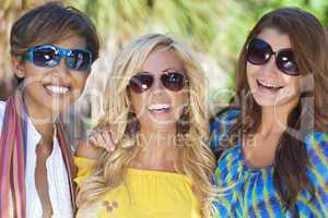 Three Beautiful Young Women Friends Laughing On Vacation