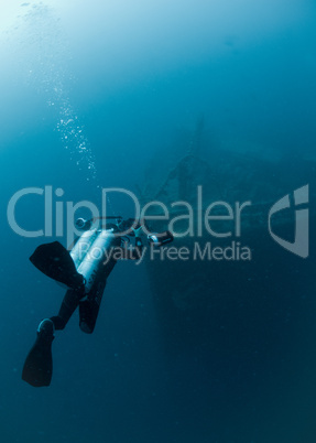 Diver over shipwreck