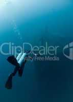 Diver over shipwreck