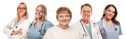 Smiling Senior Woman with Medical Doctors and Nurses Behind