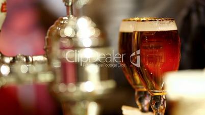 take glass with beer from bar
