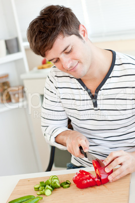 man cutting vegetables