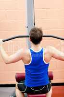 male athlete practicing body-building