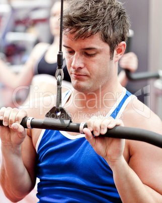 male athlete practicing body-building