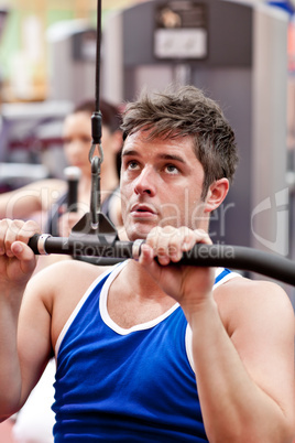 male athlete practicing body-building