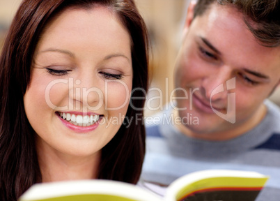 students reading a book