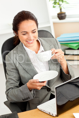 businesswoman holding a coffee