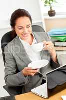 businesswoman holding a coffee