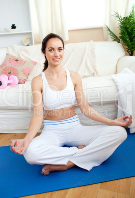 woman practicing yoga
