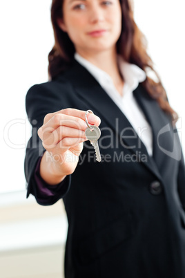 businesswoman holding a key