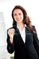 businesswoman holding a key