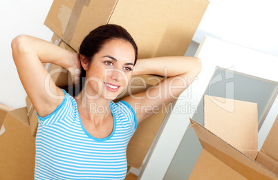 woman after unpacking cardboards