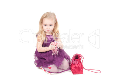 Studio shot of baby girl in gala dress