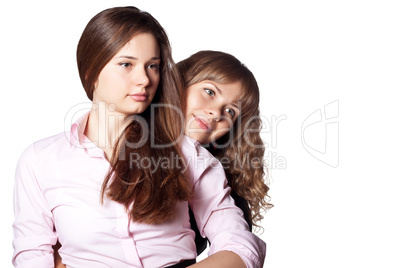 Portrait of two beautiful women on white