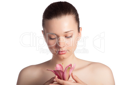 Beautiful girl holding a flower in hands