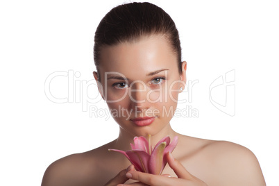 Beautiful girl holding a flower in hands