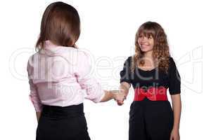 Two women posing on white background