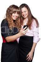 Two women posing on white background