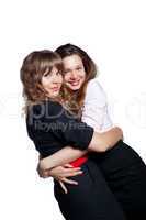 Portrait of two beautiful women on white