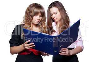 Two women posing on white background