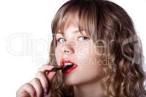 Girl posing with chocolate in hand