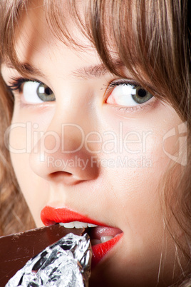 Girl posing with chocolate in hand