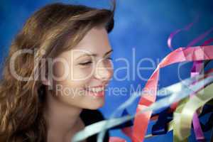 Young woman posing on a blue background