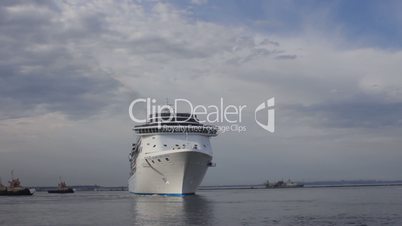 A luxury cruise ship leaving port time lapse (Full HD