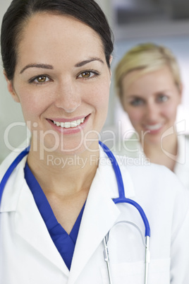 Attractive Brunette Woman Doctor With Stethoscope