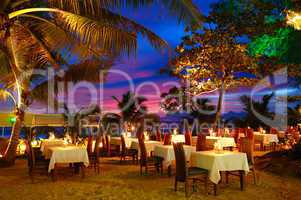 Outdoor restaurant at the beach during sunset, Phuket, Thailand