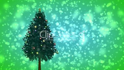 Spinning Christmas tree on green background