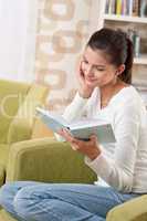 Students - Happy teenager with book