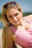 Beautiful blond woman on sunny beach