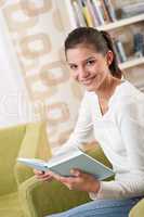 Students - Happy teenager with book