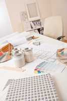 Office of interior designer with paint and color swatch