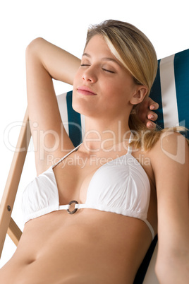 Beach - Woman in bikini relax on deck chair