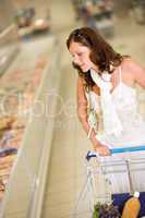 Grocery store - young woman shopping