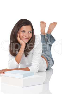 Smiling teenager with books