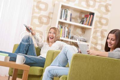 Students - Two female student  relaxing home