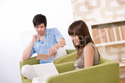 Student - two teenager reading book home