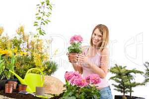 Gardening - Happy woman holding flower pot