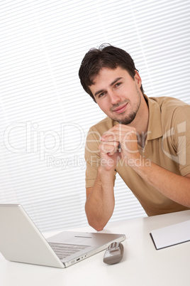 Successful modern businessman with laptop Successful modern businessman with laptop