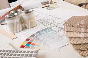 Office of interior designer with paint and color swatch