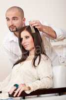 Professional hairdresser choose hair dye color at salon