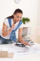 Brown hair female architect at the office